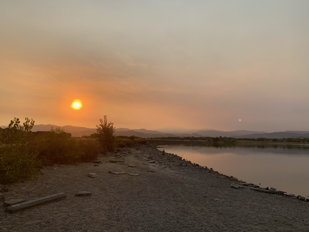 Hazy wildfire suset over the Front Range