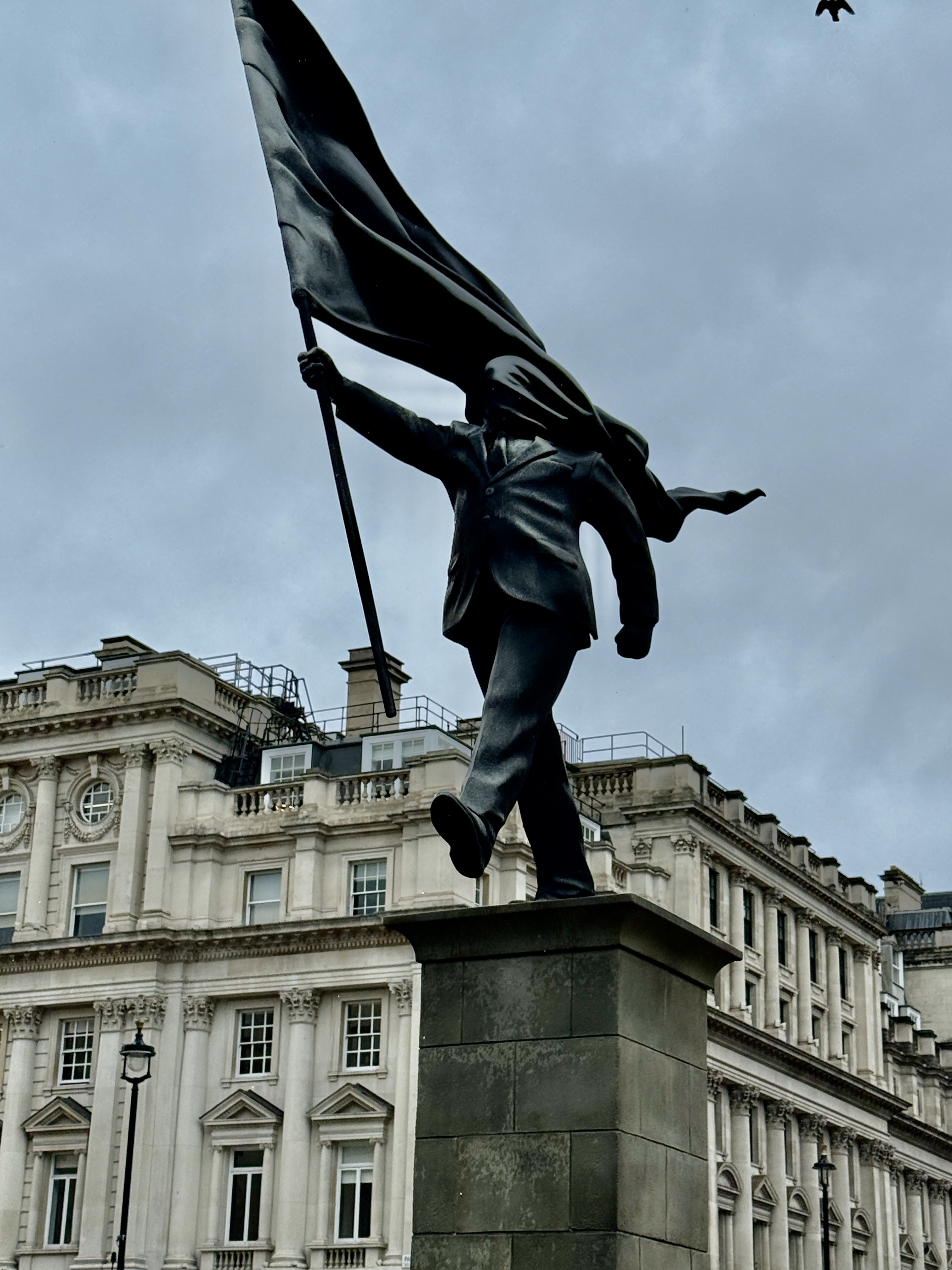 Banksy statue near Waterloo Place