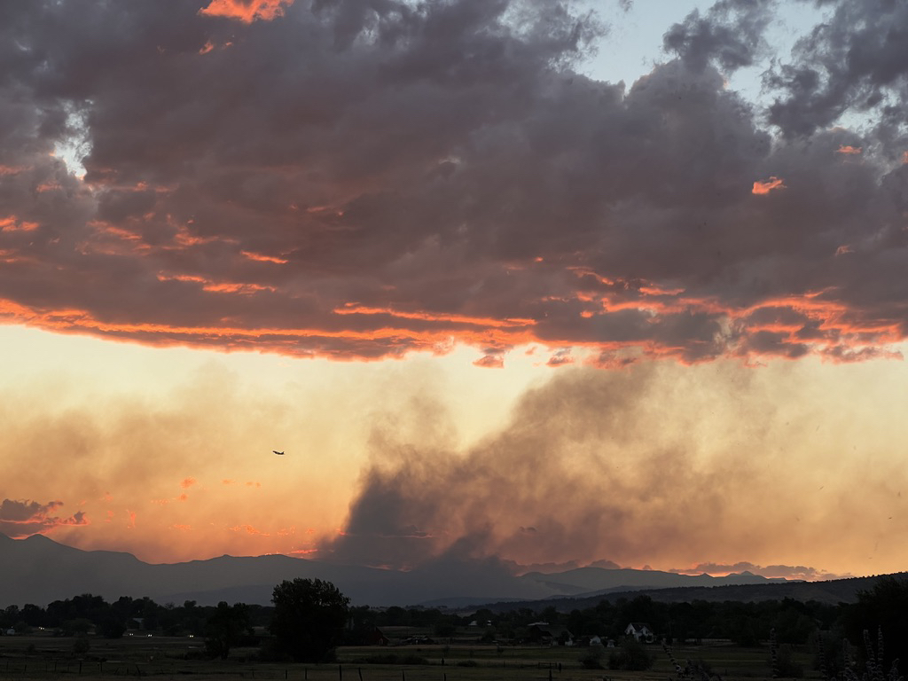 Slurry bomber after a pass at the Stone Canyon fire in Lyons, CO