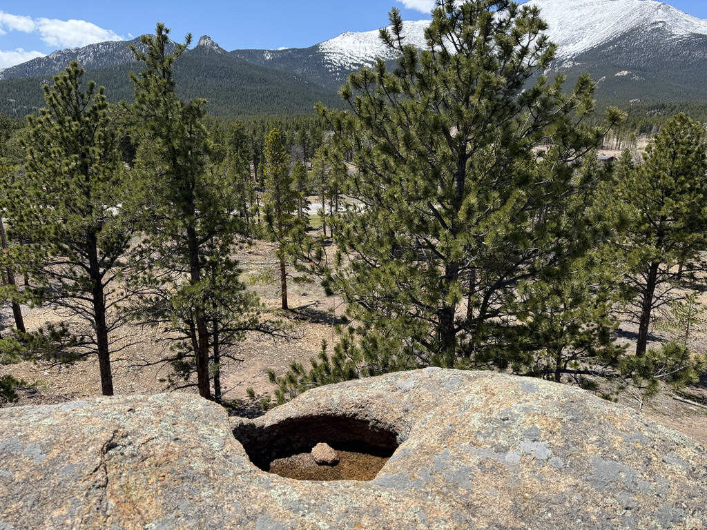 Pool in a rock overlooking Mount Meeker